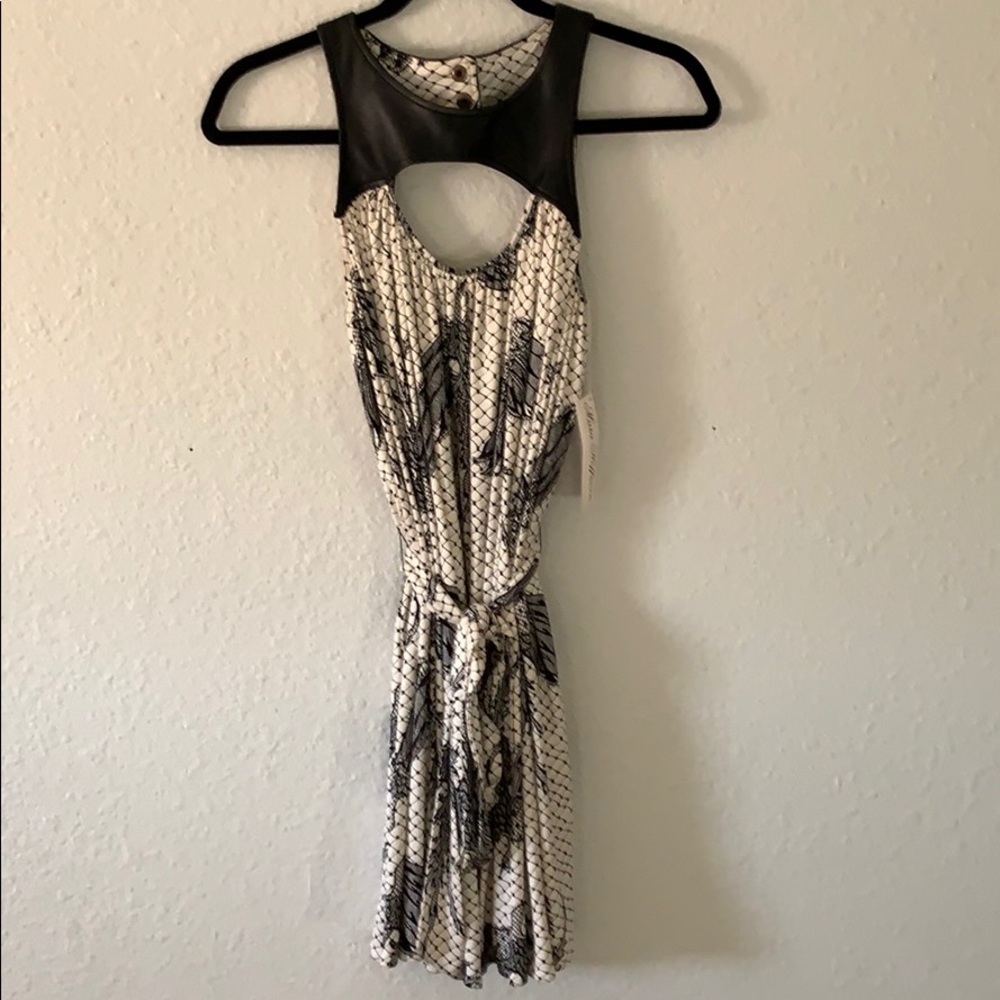 Mini dress. Mara Hoffman. Leather detail.
